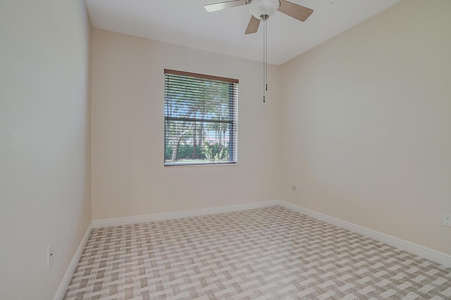 10733 Castle Oak Dr, Boynton Beach, FL 33473 - unfurnished room with baseboards and ceiling fan