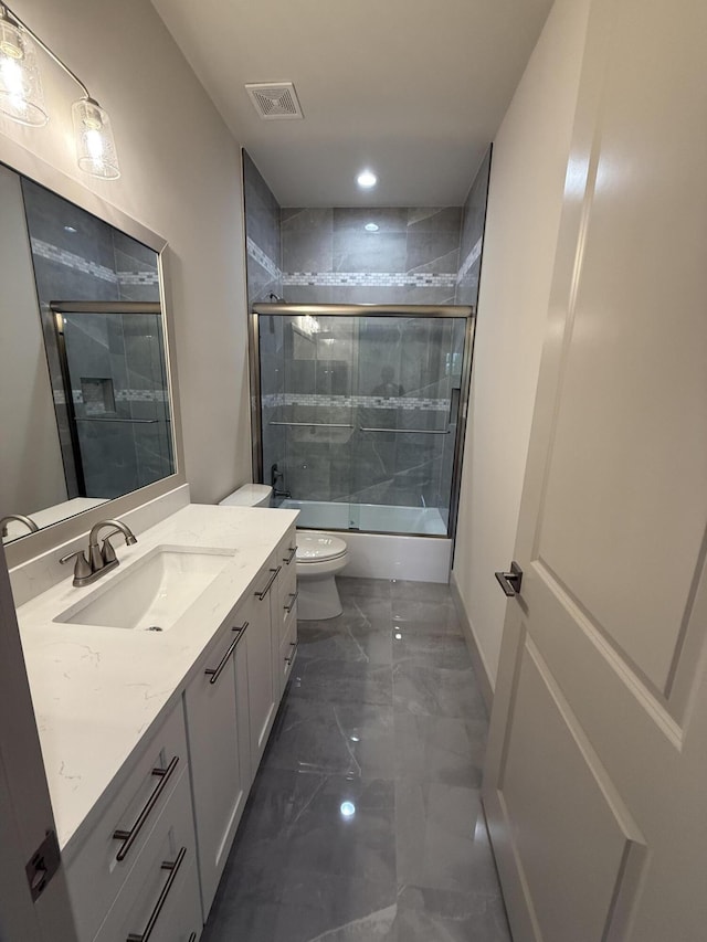 580 Lucky Ln, Delray Beach, FL 33444 - bathroom with combined bath / shower with glass door, vanity, toilet, visible vents, and marble finish floor