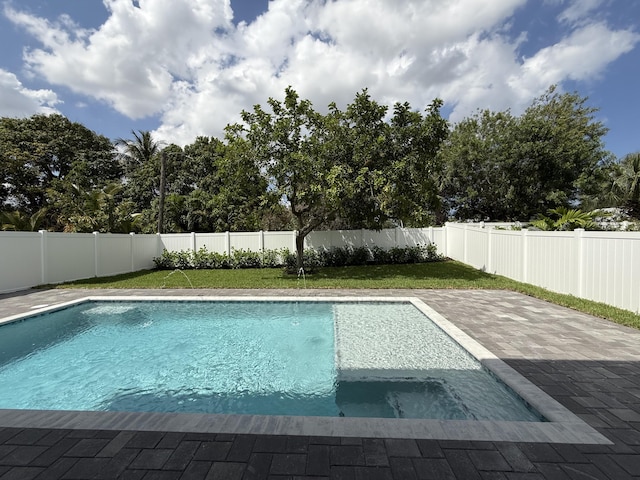 580 Lucky Ln, Delray Beach, FL 33444 - view of swimming pool with a fenced in pool, a patio area, a fenced backyard, and a lawn