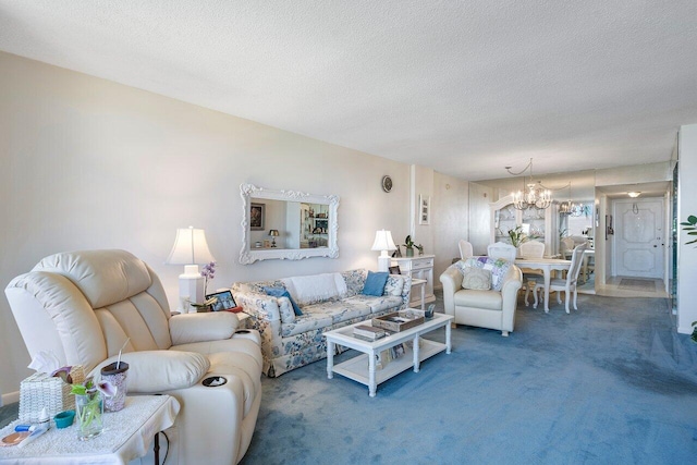 living room featuring a chandelier, a textured ceiling, and carpet floors