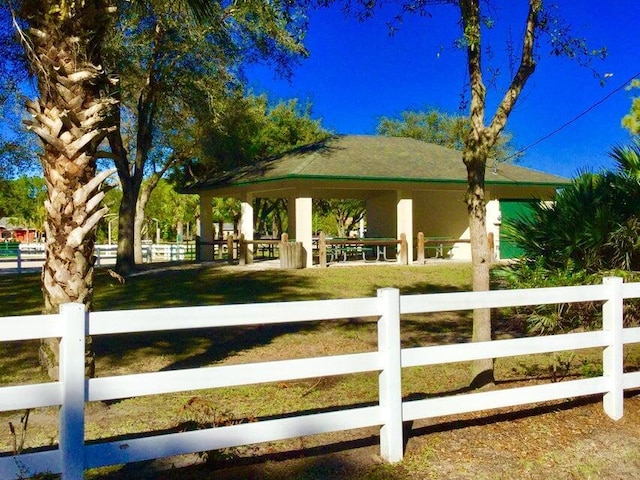 view of community with a gazebo and fence