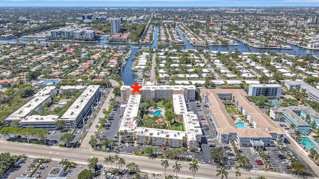 birds eye view of property featuring a water view