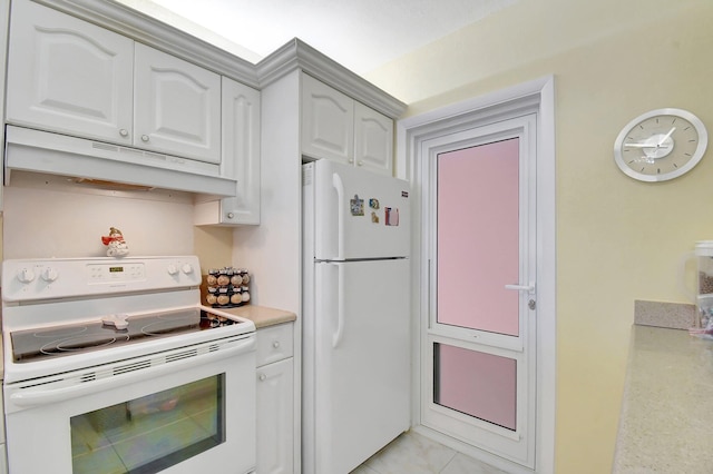 kitchen featuring under cabinet range hood, white appliances, white cabinetry, and light countertops