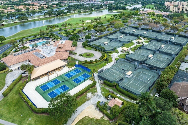 aerial view featuring view of golf course and a water view