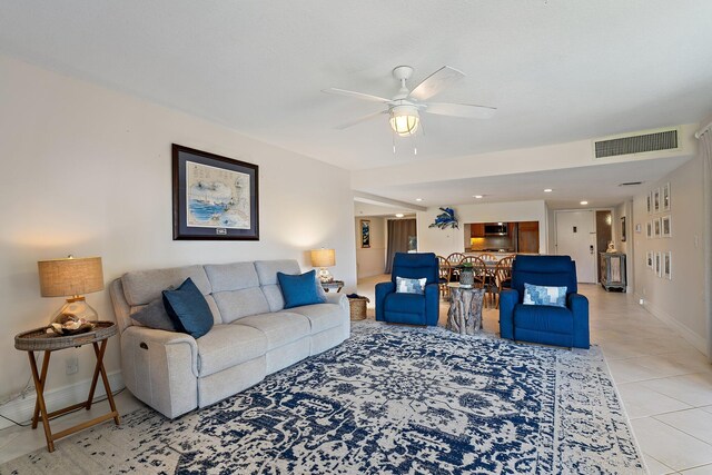 dining area featuring light tile patterned floors, recessed lighting, a textured ceiling, and baseboards