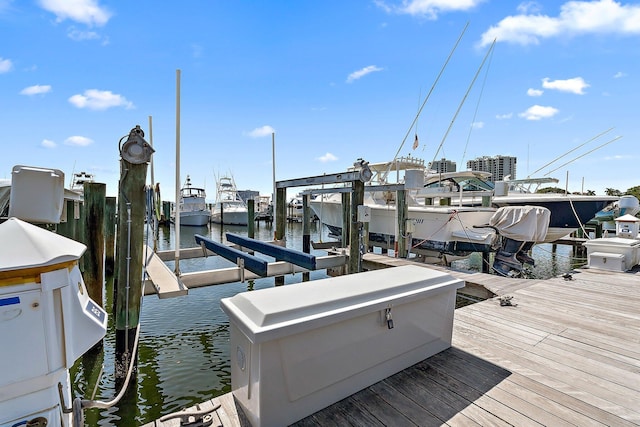 view of dock with a water view and boat lift