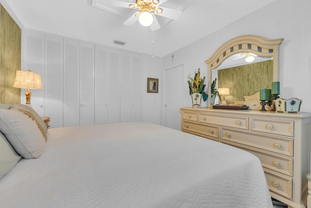 bedroom featuring visible vents and a ceiling fan