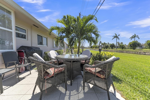 view of patio featuring outdoor dining area and grilling area