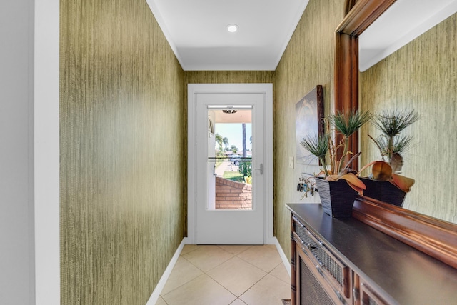 entryway with wallpapered walls, light tile patterned flooring, and baseboards