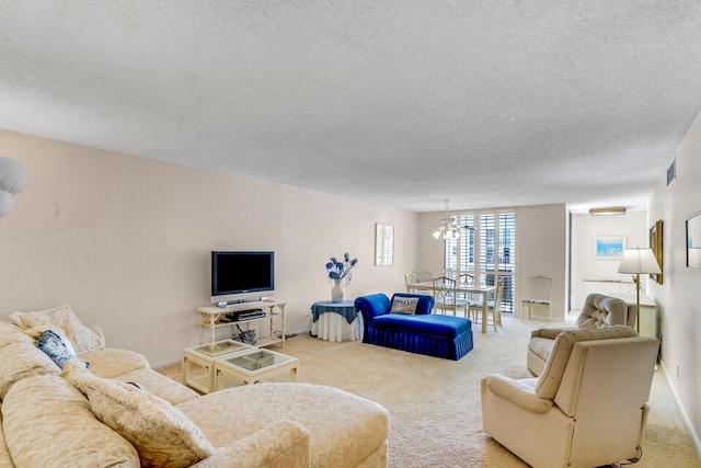 living room featuring carpet flooring, a textured ceiling, and visible vents