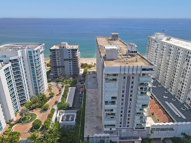 aerial view featuring a city view and a water view