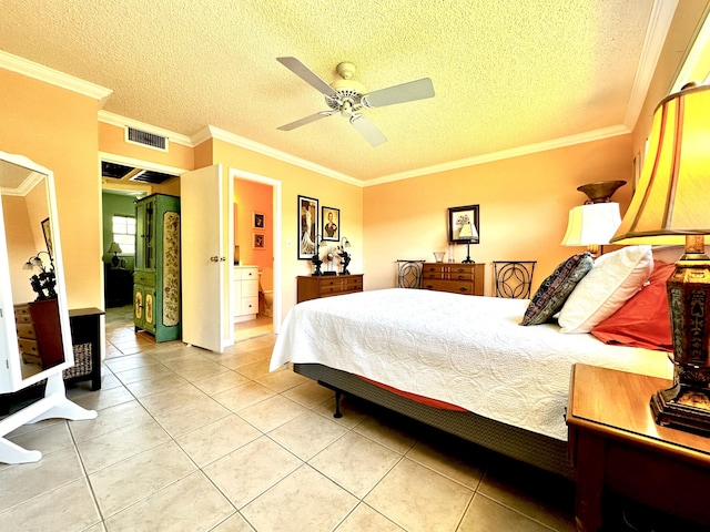 bedroom featuring light tile patterned floors, visible vents, a textured ceiling, and ornamental molding