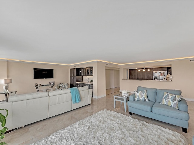 living room featuring visible vents and marble finish floor