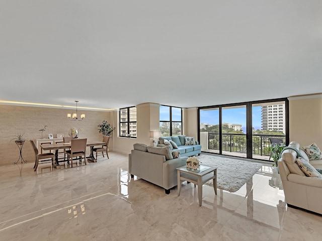 living room with expansive windows, marble finish floor, a chandelier, and ornamental molding