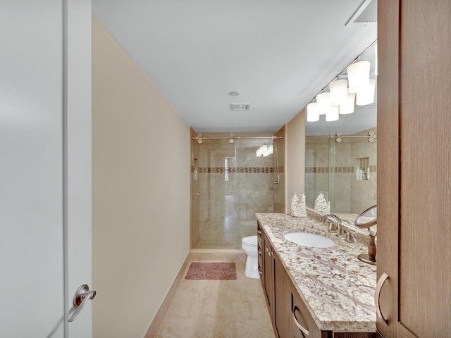 full bathroom featuring visible vents, vanity, toilet, and a shower stall