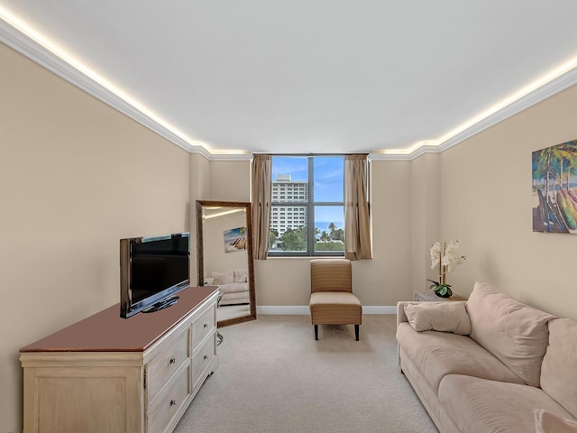 living room featuring light colored carpet, crown molding, and baseboards