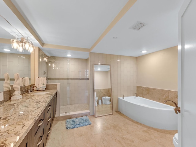 full bath featuring visible vents, toilet, a garden tub, a stall shower, and vanity