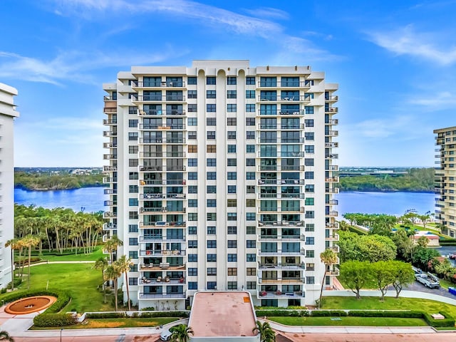 view of building exterior featuring a water view