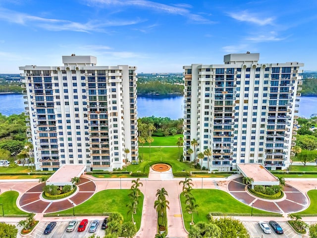 view of building exterior with a water view