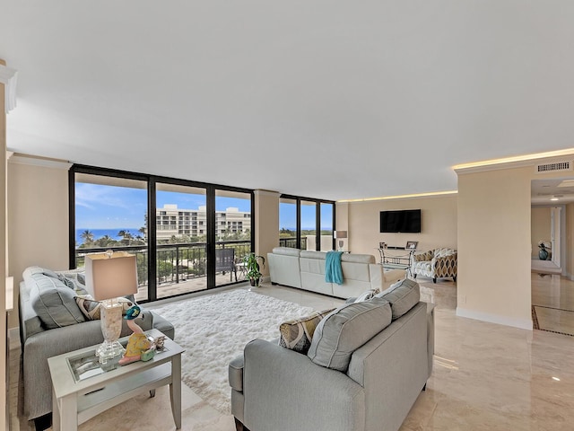 living room with ornamental molding, baseboards, visible vents, and expansive windows