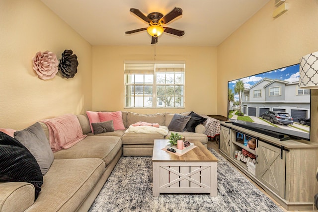 living room featuring ceiling fan