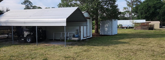 view of outdoor structure with a carport and an outdoor structure