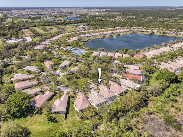 aerial view featuring a residential view and a water view