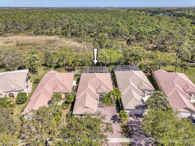 aerial view with a wooded view