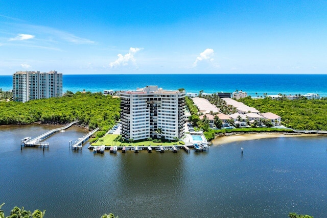 birds eye view of property featuring a water view