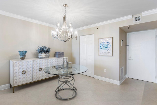 dining room featuring visible vents, baseboards, and crown molding