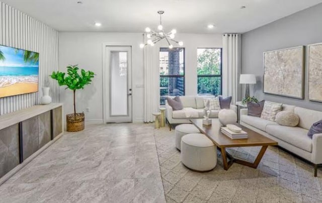 living area featuring a chandelier and recessed lighting