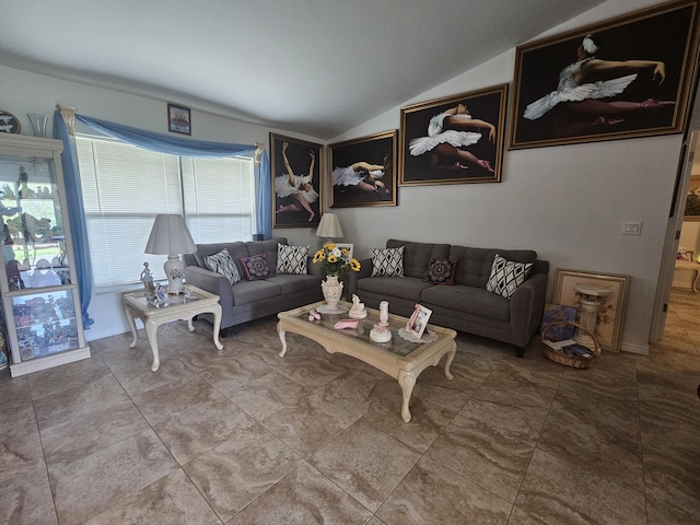 living room featuring vaulted ceiling