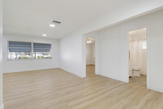 spare room featuring recessed lighting, visible vents, baseboards, and light wood-style flooring