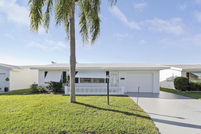 ranch-style home with stucco siding, a front lawn, central AC, concrete driveway, and a garage