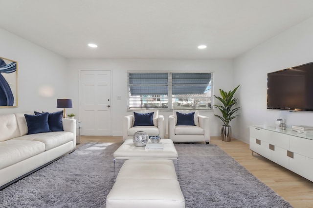 living room featuring light wood-style floors and recessed lighting