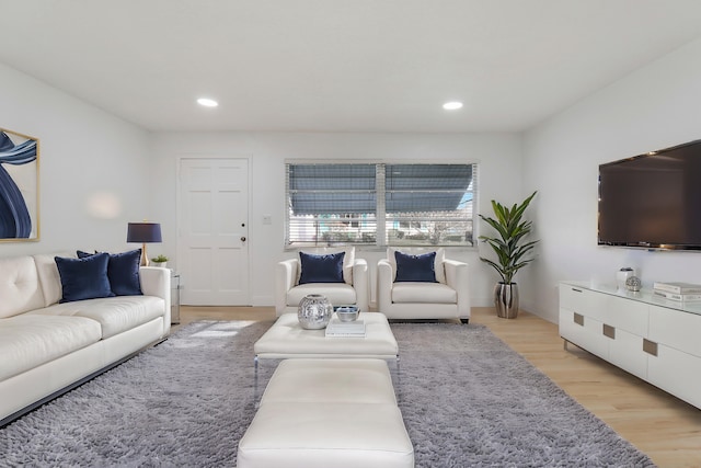 living room featuring recessed lighting and light wood-style flooring