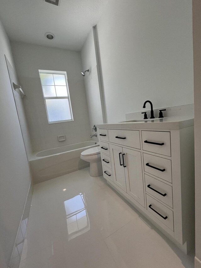 bathroom featuring visible vents, toilet, tile patterned floors, vanity, and  shower combination