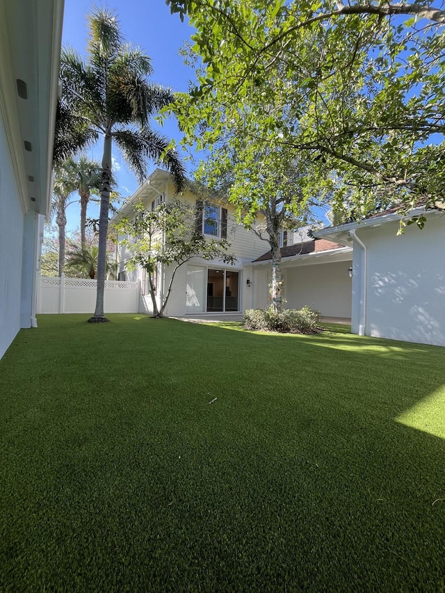 view of yard featuring fence