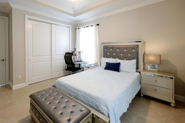 bedroom featuring tile patterned floors, baseboards, a closet, and ornamental molding