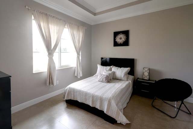 bedroom with baseboards and ornamental molding