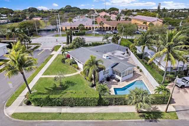 birds eye view of property with a residential view