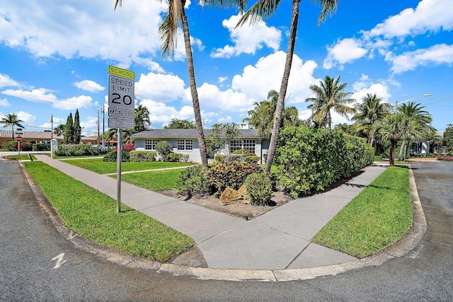 view of front of house with a front lawn