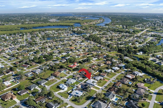 aerial view featuring a water view and a residential view