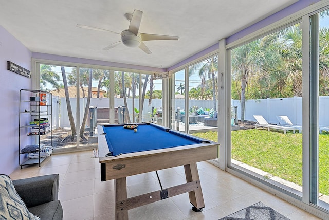 game room featuring light tile patterned floors, pool table, and ceiling fan