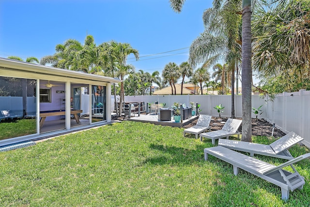 view of yard with a fenced backyard and a patio area