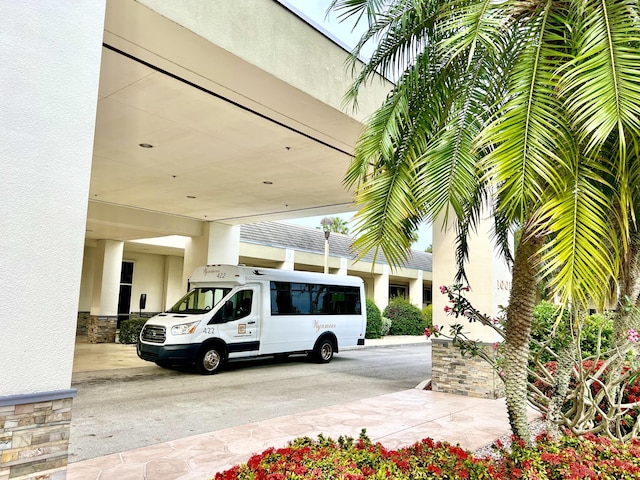 exterior space featuring concrete driveway