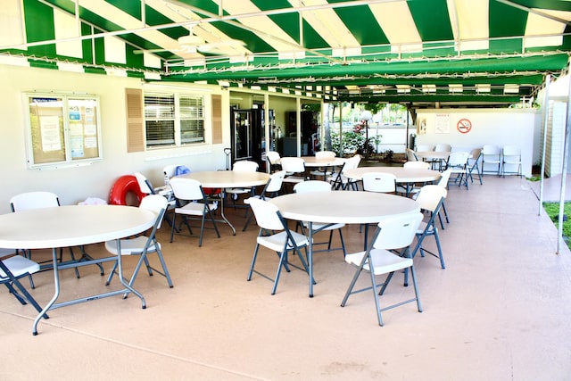 view of patio featuring outdoor dining space