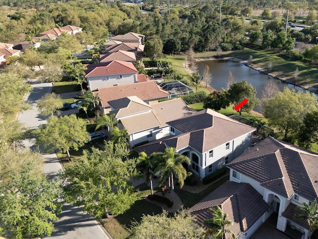 bird's eye view with a water view