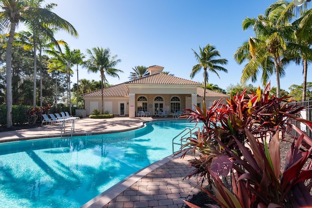 pool with a patio area