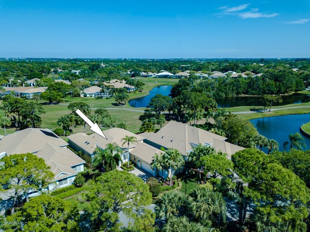 drone / aerial view with a water view